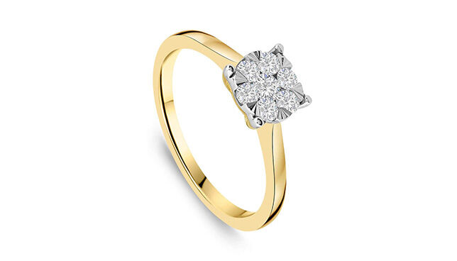 Yellow gold illusion-set diamond solitaire cluster engagement ring